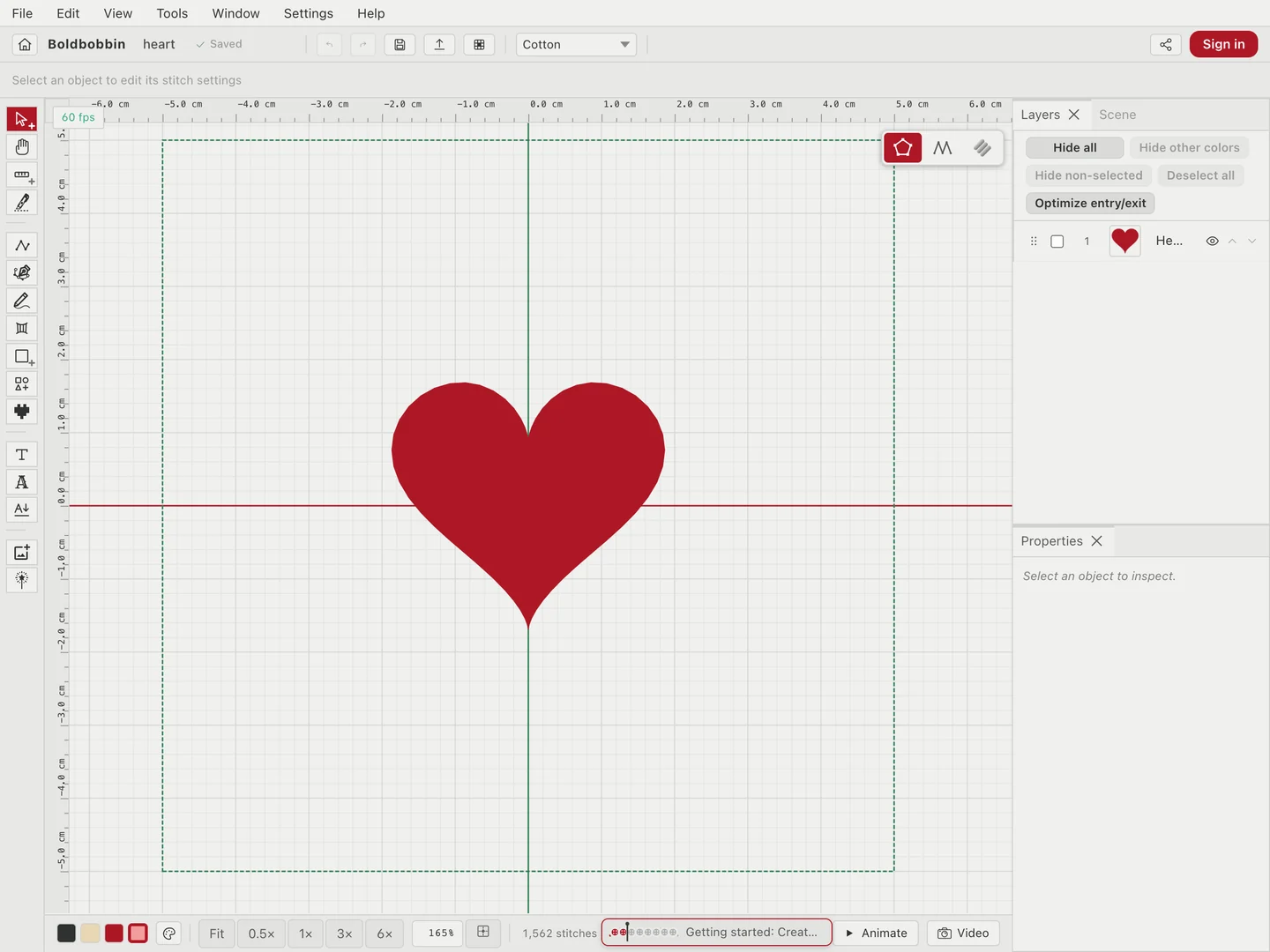 The Boldbobbin editor window with the Heart template open: the tool rail down the left, a red heart on the canvas inside a dashed hoop outline, and the Layers and Properties panels on the right.