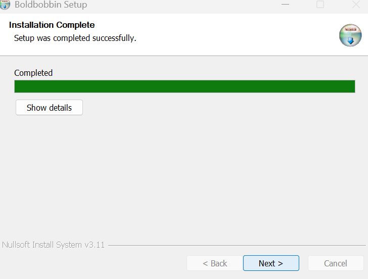 An installer screen headed Installation Complete, Setup was completed successfully, with a full green progress bar labelled Completed and a Show details button under it.