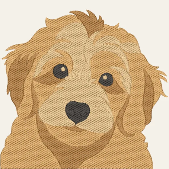 A golden dog's face worked in flat blocks of tan and cream thread, the rows of each block running at their own angle.
